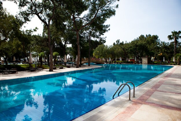 Swimming pool in the hotel summer holidays in hot tropical countries relaxation zone