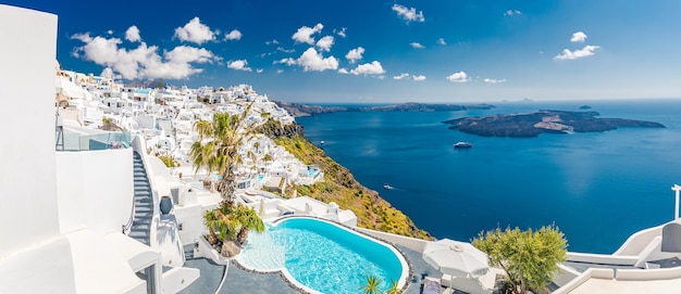 Swimming pool panoramic view Caldera over Aegean sea Santorini Greece sunny summer holiday template