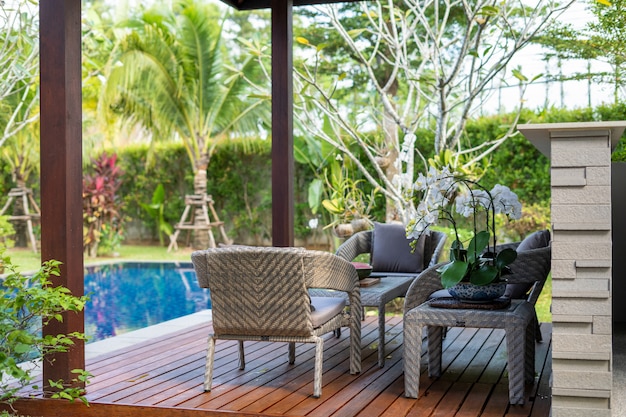 Swimming pool and pavilion with green garden