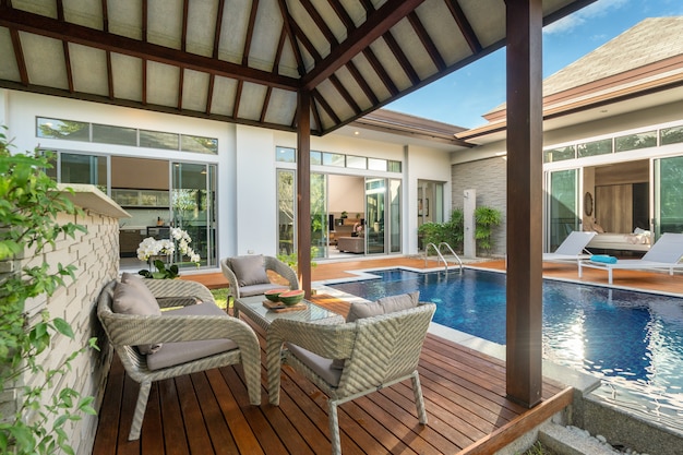 Swimming pool and pavilion with green garden