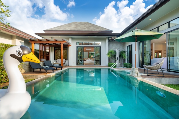 Swimming pool in tropical garden villa