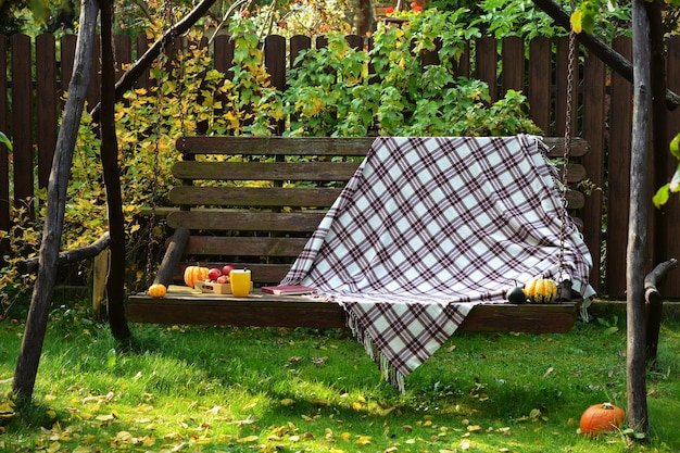 Swing in the autumn garden a place to relax