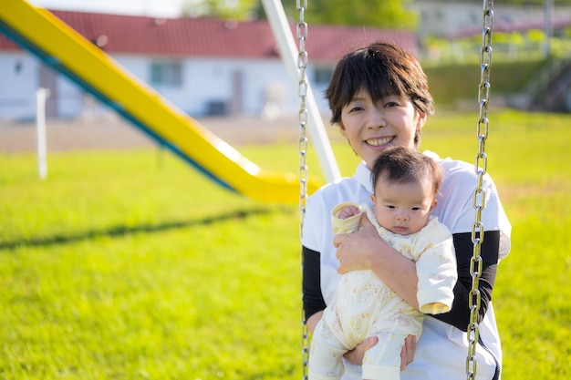 Swing and parent and child