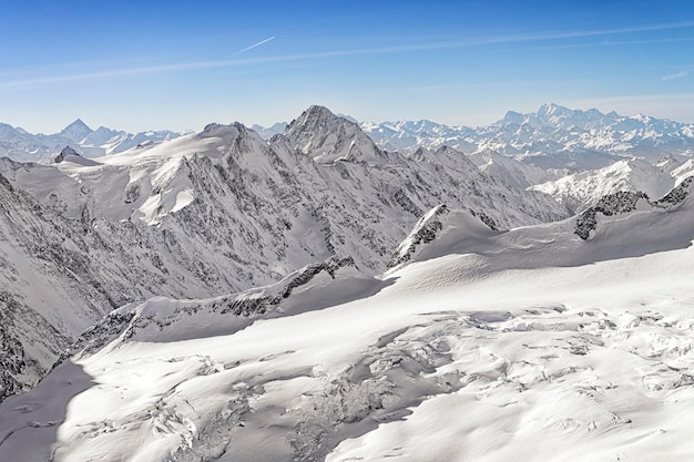 Swiss alpine peaks landscape panorama of Bern Highland helicopter view