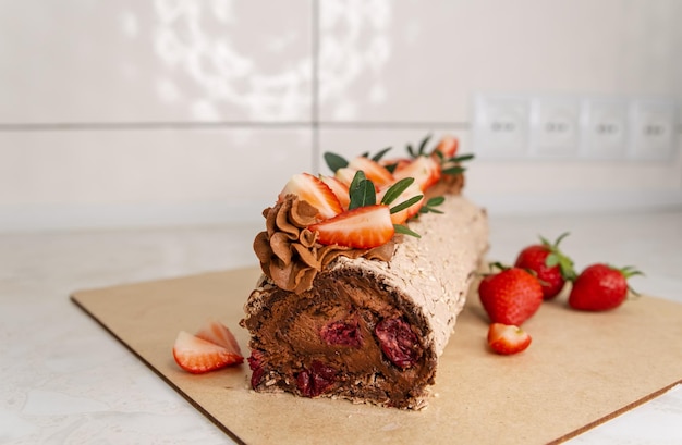 Swiss roll cake with strawberries and cream Chocolate roll cake