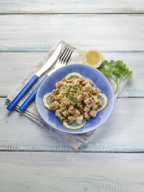 Swordfish with artichoke and parsley