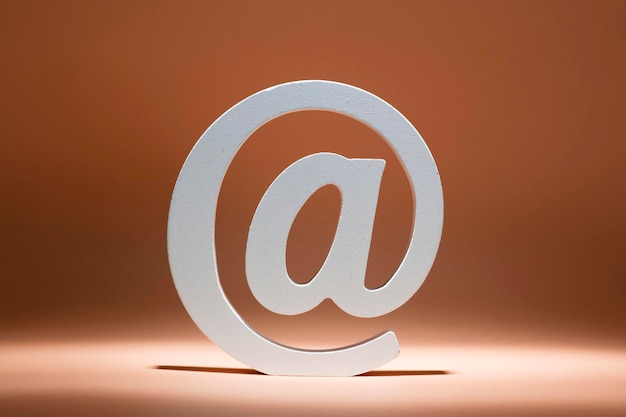 Symbol email placed on a neutral background digital communication