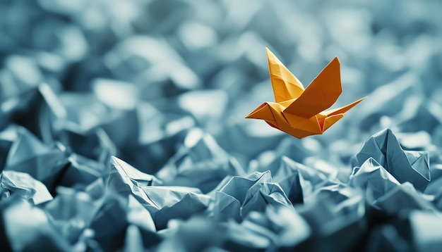 Symbolic Representation Of Innovation And Inspiration Through The Transformation Of Crumpled Papers Into An Origami Bird In Flight