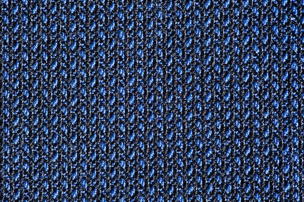 Synthetic fabric, blue and black threads, background structure, close-up macro view