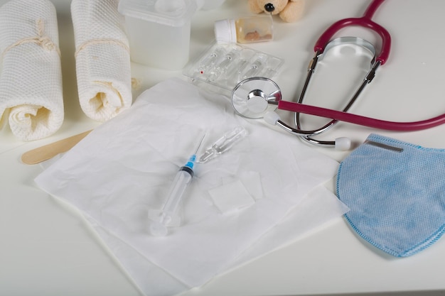 Syringe and vaccine on a sterile napkin Closeup