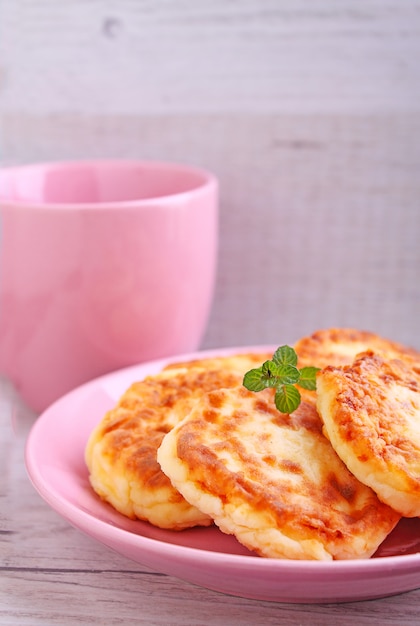 Syrniki (Cottage cheese pancakes, Fritters of cottage cheese) traditional Ukrainian and Russian cuisine.