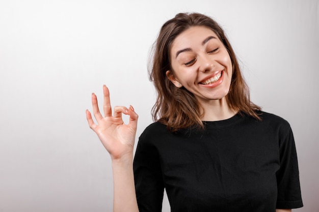 T-shirt design, happy people concept - smiling woman in black t-shirt