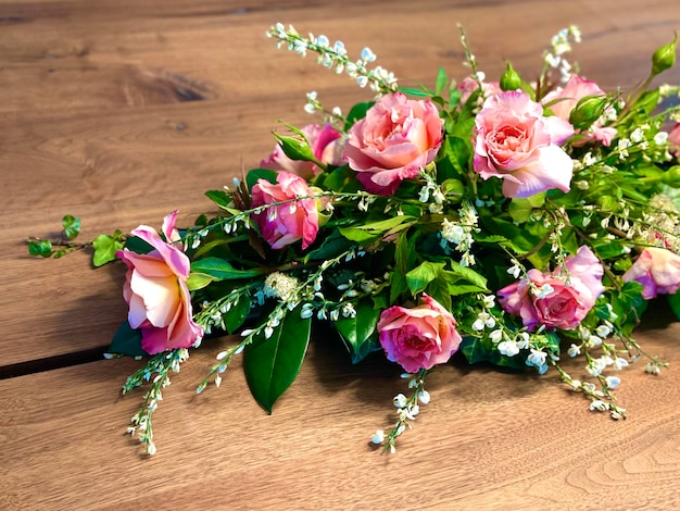 Photo table decor with pink roses