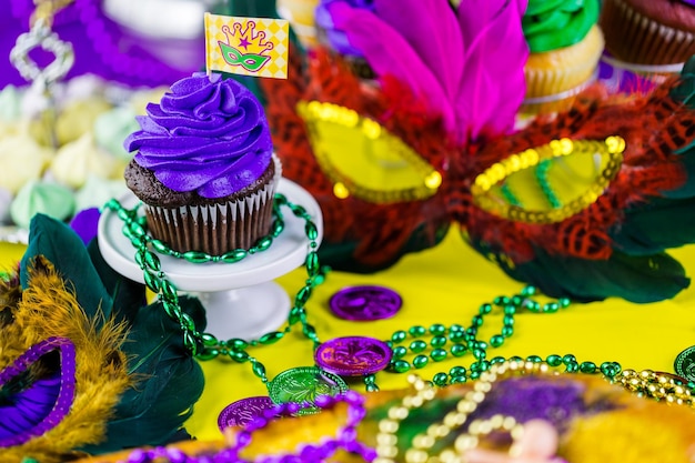 Table decorated for Mardi Gras party.