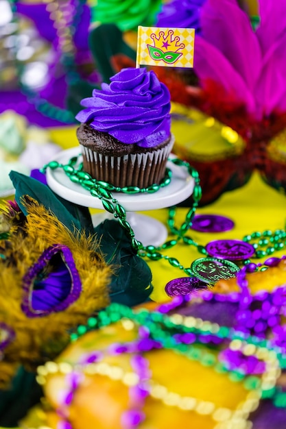 Table decorated for Mardi Gras party.