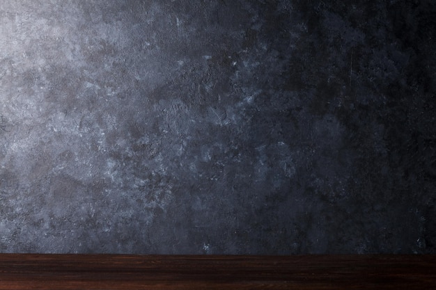 Table in front of chalkboard wall