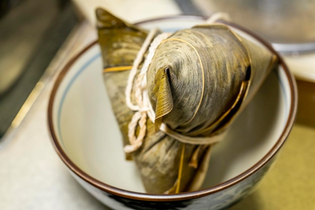 On the table magnetic bowls disassembled steaming hot meat dumpling dumpling leaves