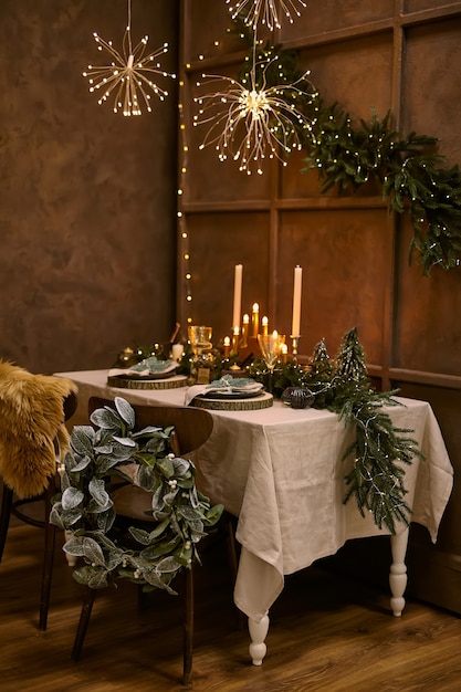 Table served for Christmas dinner, festive setting with decorations