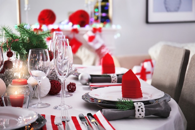 Table served for Christmas dinner in living room, close up view