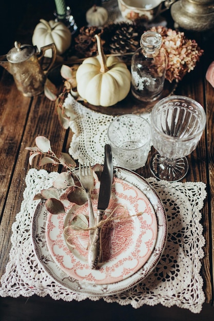 table setting in vintage style on a dark background festive luxury dinner