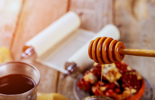 On the table in the synagogue are the symbols of Rosh hashanah Jewish New Year holiday