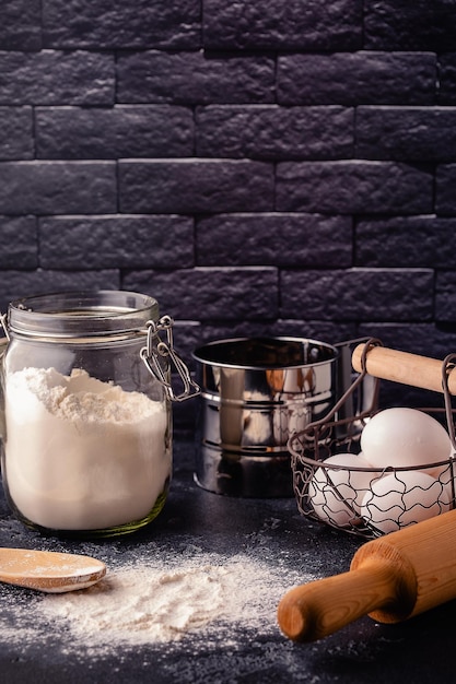 Table with baking products and tools