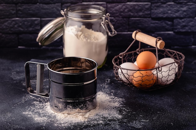 Table with baking products and tools