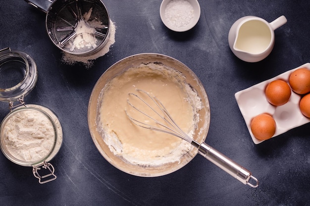 Table with baking products and tools