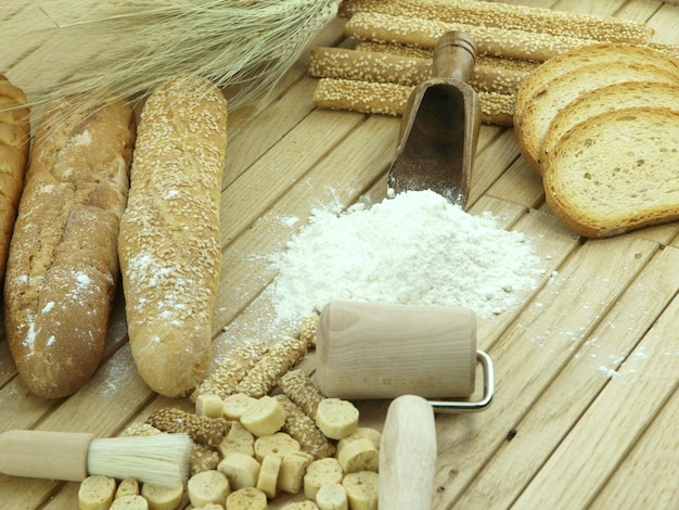 A table with bread and flour on it