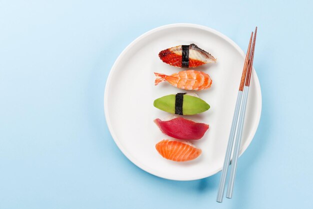 Photo table with empty plate and chopsticks epitomizing japanese food culture