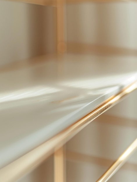 a table with a gold metal frame and a window in the background