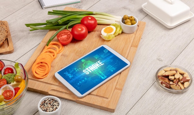 Tablet Pc with fruits medical concept