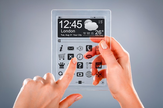 Tablet with a transparent display in human hands. Concept actual future innovative ideas and best technologies humanity.