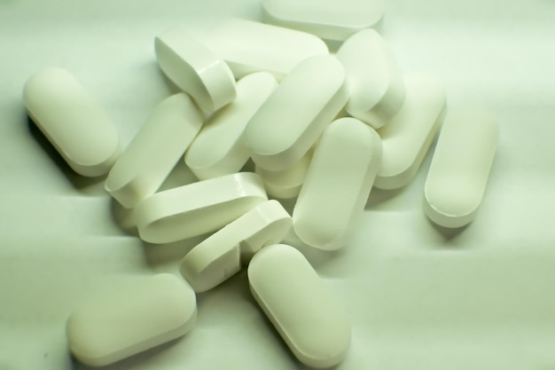 Tablets white tablets closeup the concept of health treatment