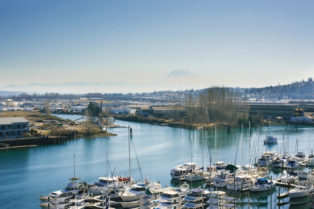 Tacoma, Washington, USA. March 2021. Puget Sound Yachts and Rainier Volcano View