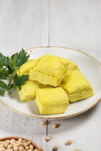 Tahu kuning or raw yellow tofu is one of type traditional food in Indonesia