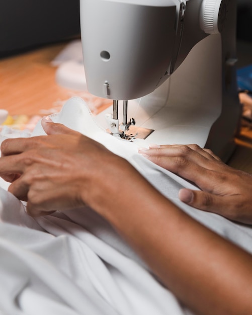 Tailor using a sewing machine