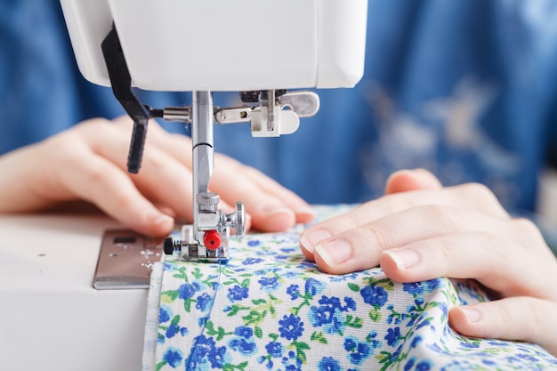 Tailor working on a sewing machine