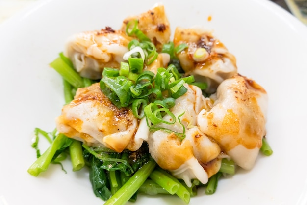 Taiwan traditional food of spicy wontons in a bowl