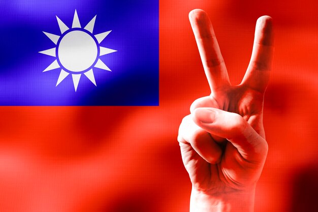 Photo taiwan two fingers showing peace sign and national flag