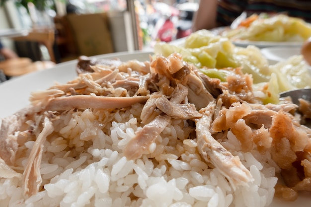 Taiwanese traditional food of shred chicken rice on table