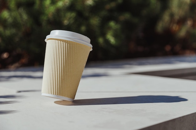 Takeout coffee paper cup falling hurry and rush business city rhythm concept