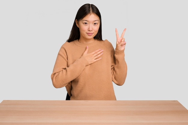 Taking an oath putting hand on chest