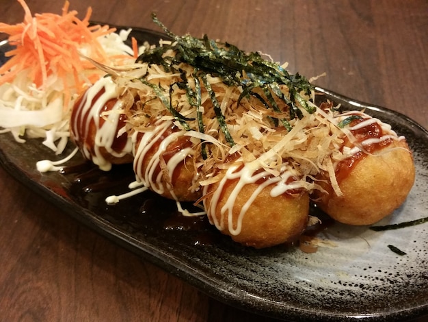 Takoyaki, a Japanese snack balls containing pieces of octopus