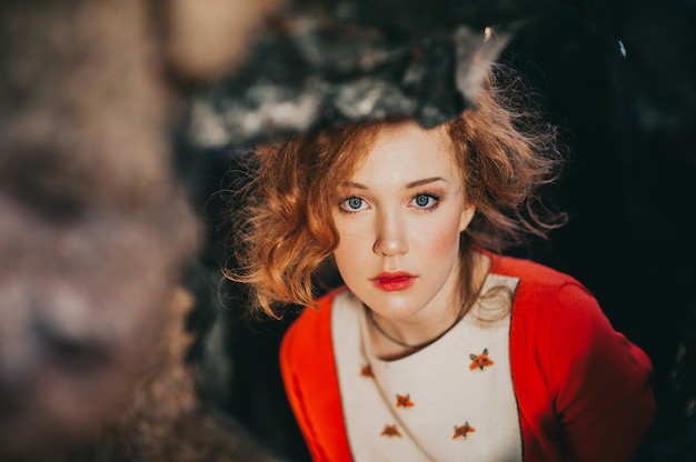 Photo tale. fantastic redhead girl in a mysterious forest