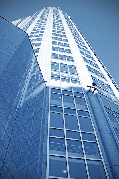 A tall building with a blue sky background