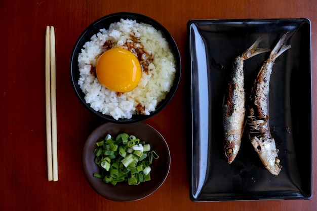 tamago kake gohan or raw egg on rice traditional food from japan eat on breakfast