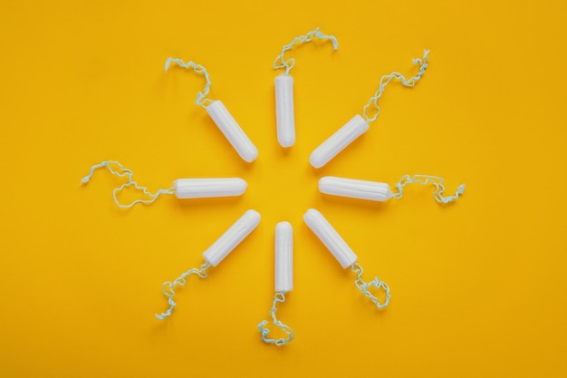 Tampon flat lay with circle or sun shape