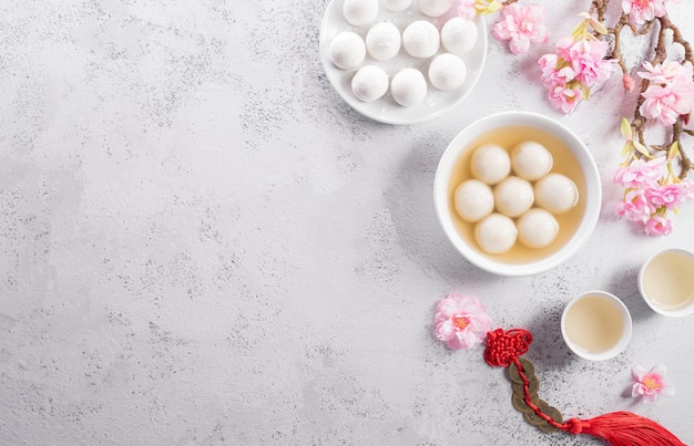 Tang Yuansweet dumplings balls a traditional cuisine for Midautumn Dongzhi winter solstice and Chinese new year Chinese characters FU in the article refer to fortune wealth money flow