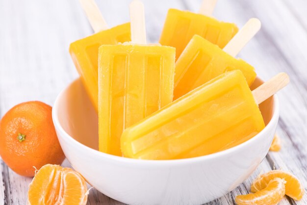 Tangerine Popsicles closeup shot selective focus